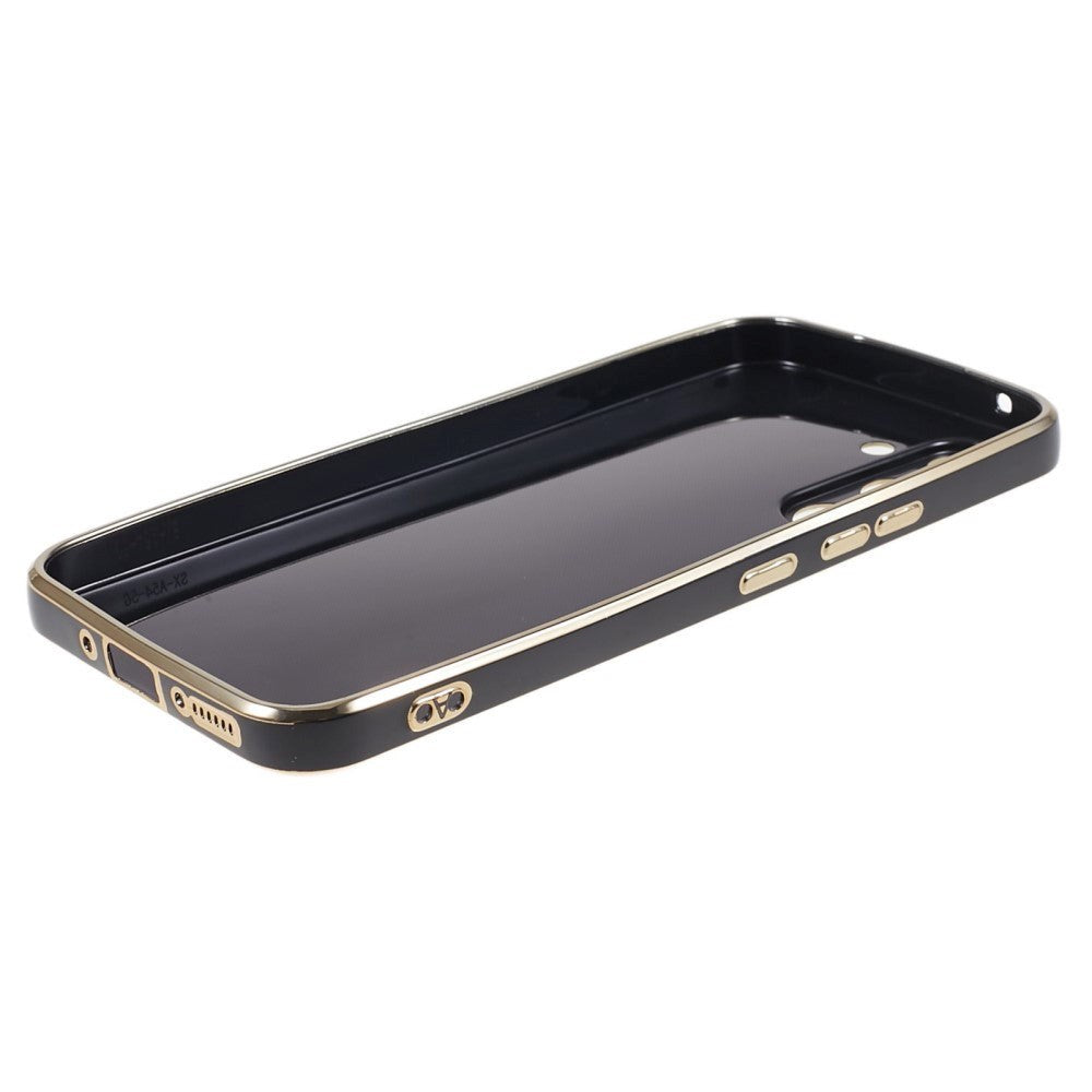 Samsung Galaxy S23 FE Fleksibelt Plastik Cover m. Guld Kant - Sort